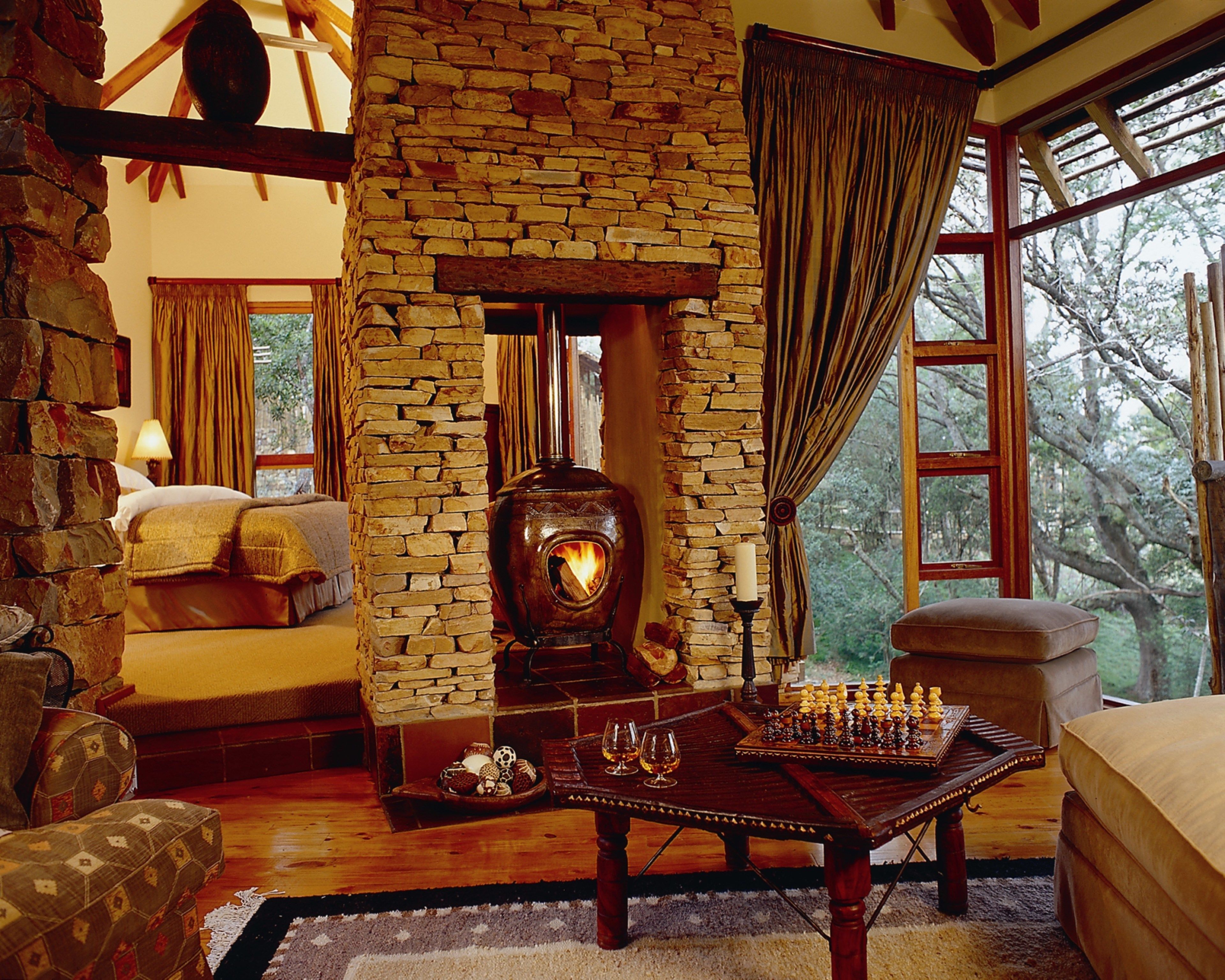 Tsala Suite | Living area | Flat-screen TV, fireplace, DVD player