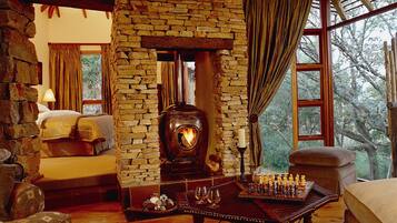 Tsala Suite | Living area | Flat-screen TV, fireplace, DVD player