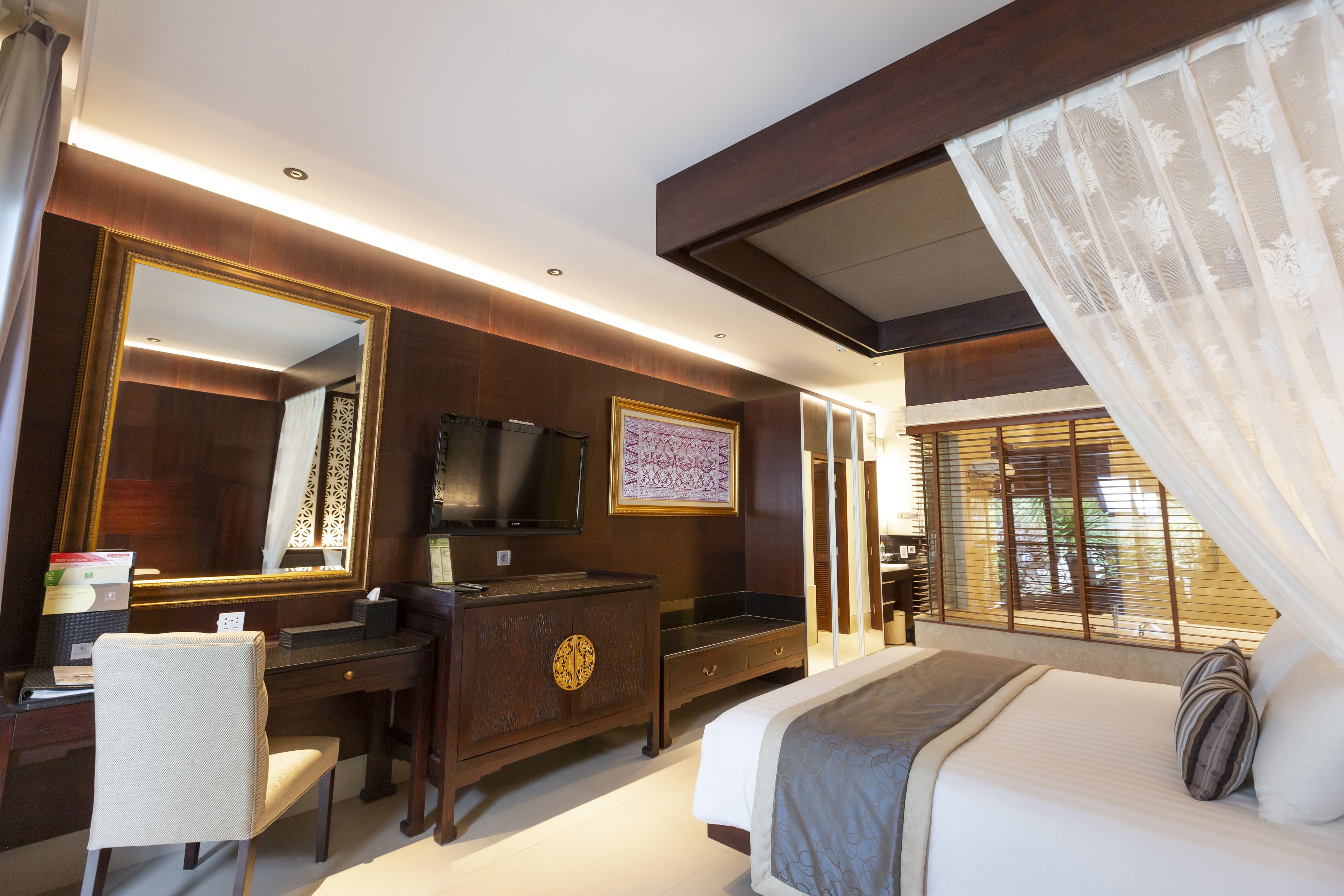 santrian deluxe room | 1 bedroom, minibar, in-room safe, desk