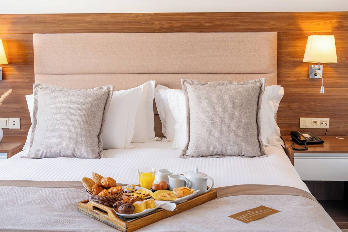 Premium bedding, pillow-top beds, free minibar items, in-room safe