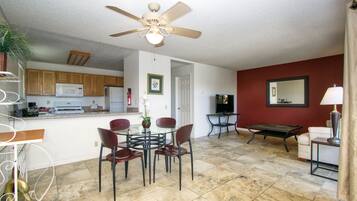 Suite One Bedroom King | Living area | Flat-screen TV, DVD player