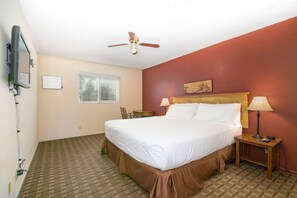 Suite One Bedroom King | Premium bedding, pillowtop beds, in-room safe, individually furnished