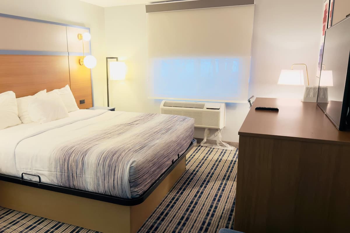 Escritorio, tabla de planchar con plancha y cunas