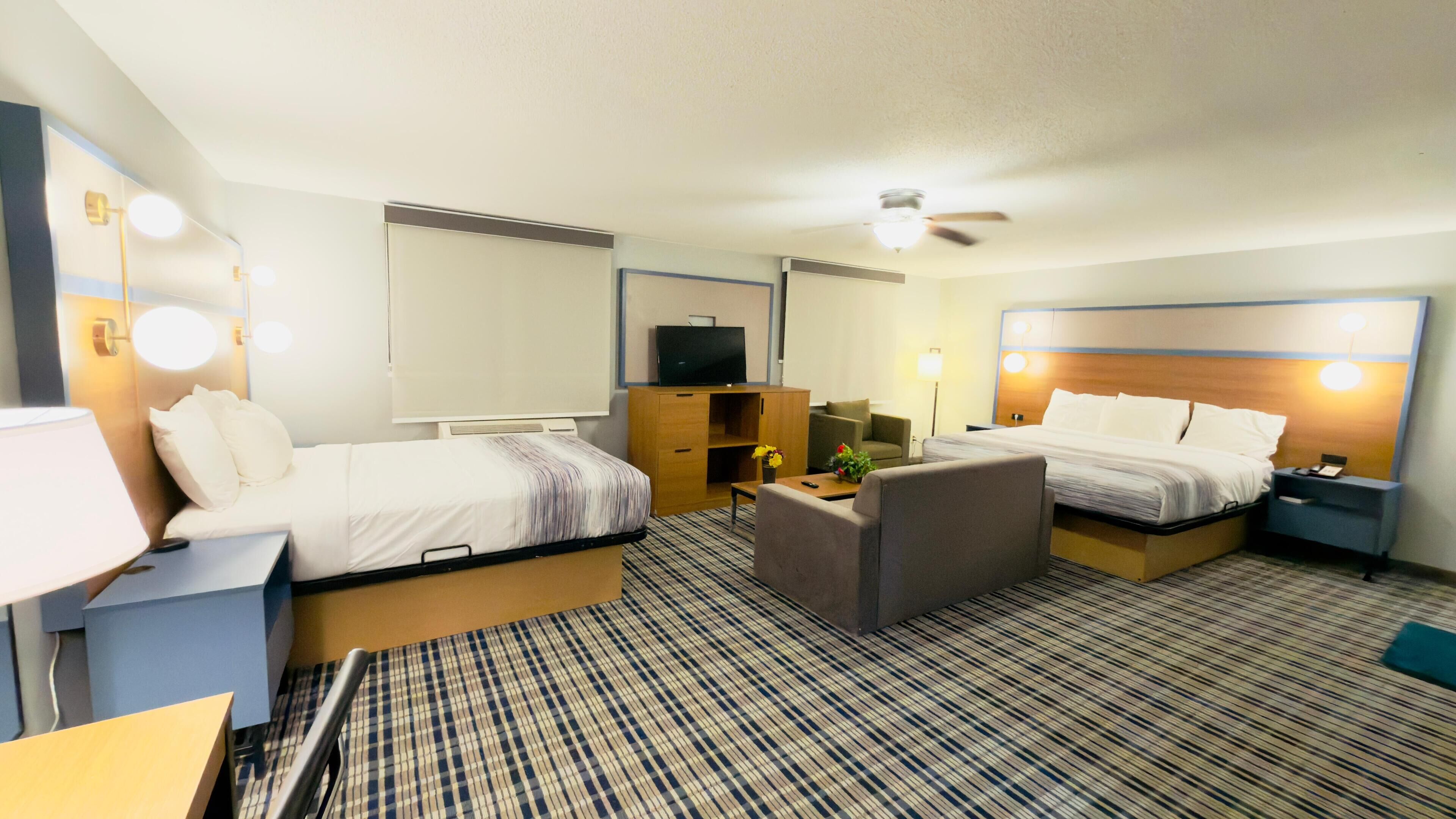 Suite – deluxe, flere senger, ikke-røyk | Skrivebord, skrivebord for bærbar PC, strykejern/-brett og barnesenger