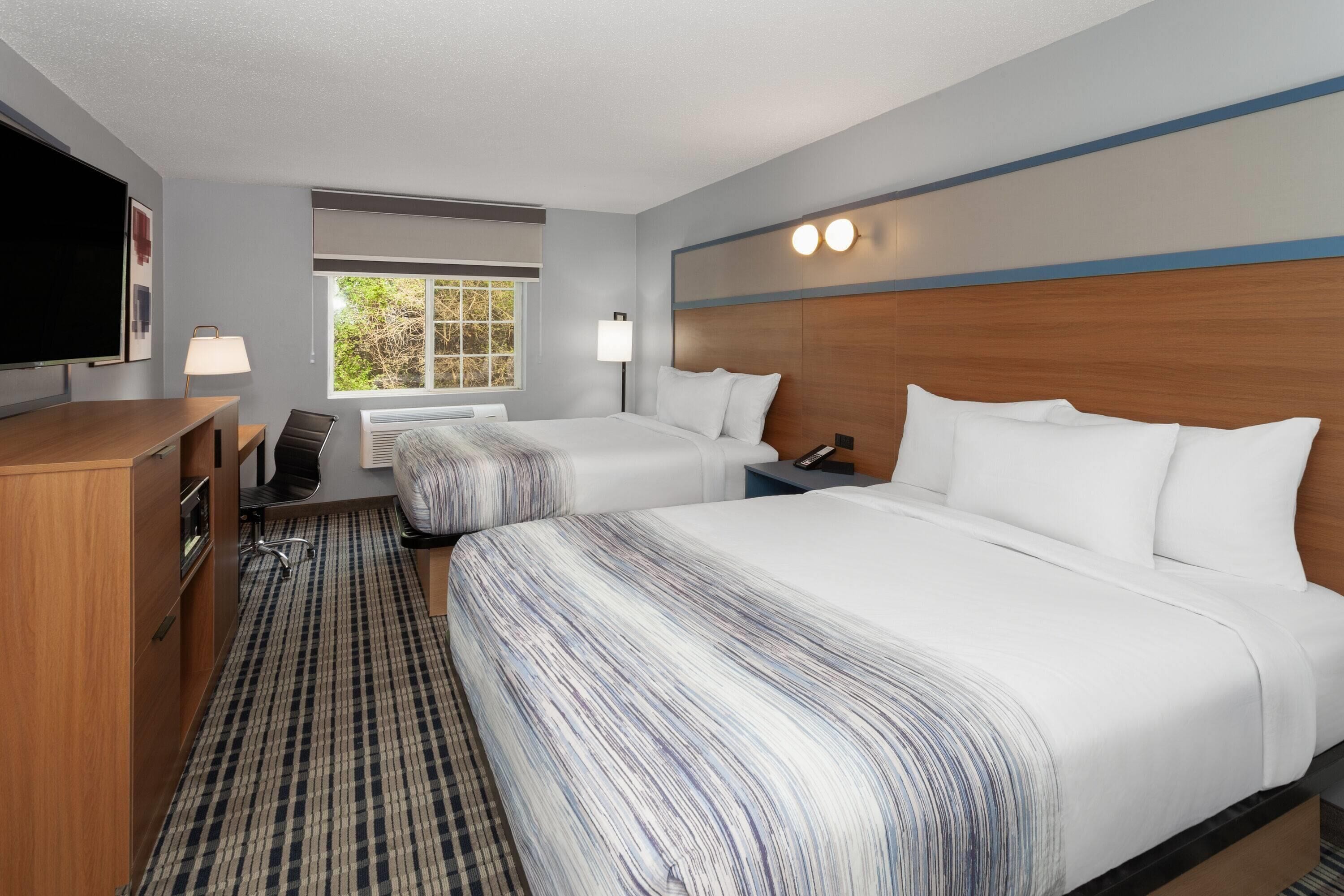 Room, 2 Queen Beds, Non Smoking | Desk, laptop workspace, iron/ironing board, cots/infant beds