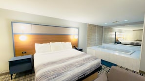 Deluxe Suite, Multiple Beds, Non Smoking | Desk, laptop workspace, iron/ironing board, cribs/infant beds - AmericInn by Wyndham Lake Mills (Lake Mills)