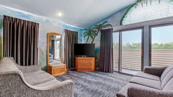 Suite, Multiple Beds, Non Smoking (Theme Room) | In-room safe, desk, blackout curtains, iron/ironing board