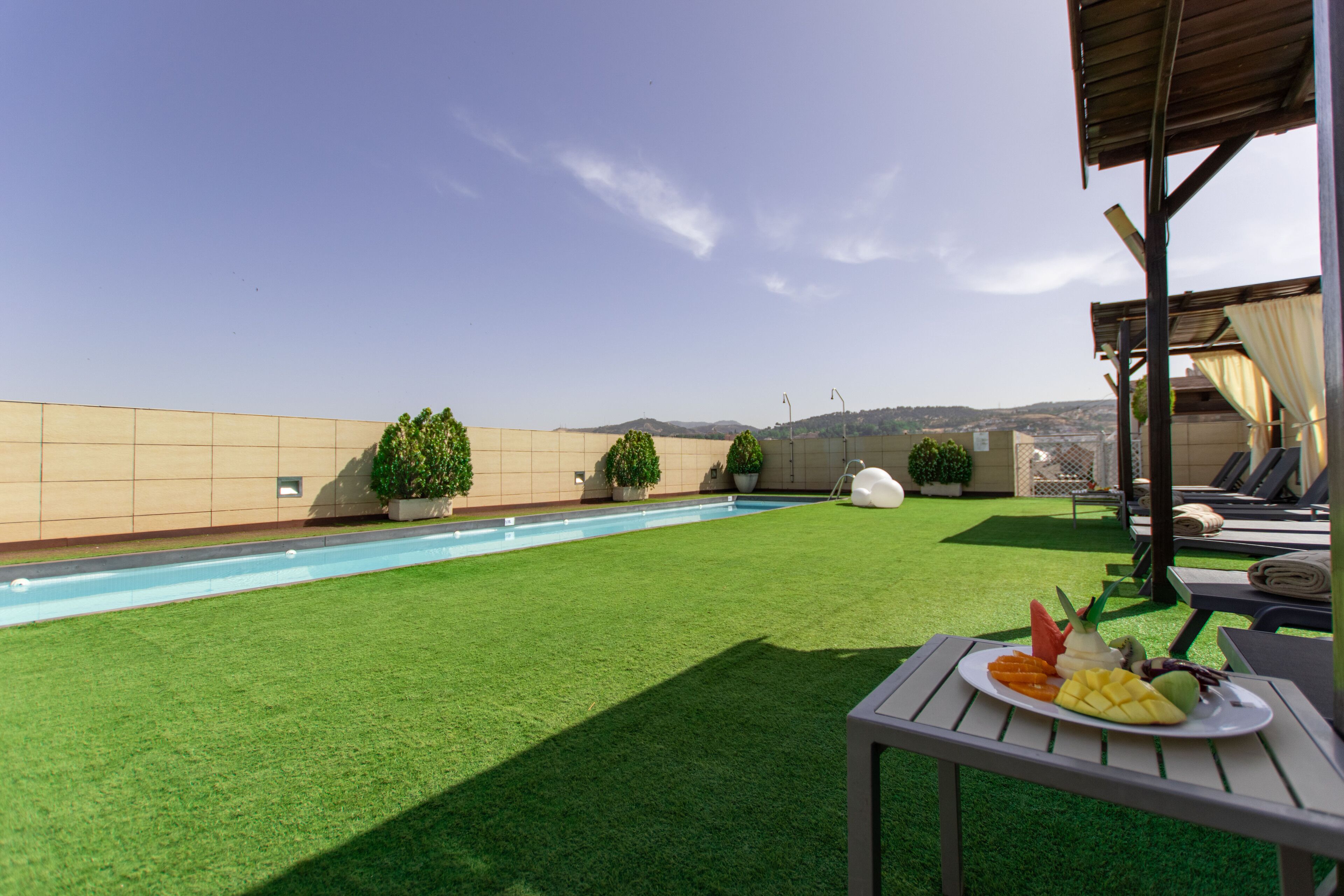 outdoor pool, pool loungers