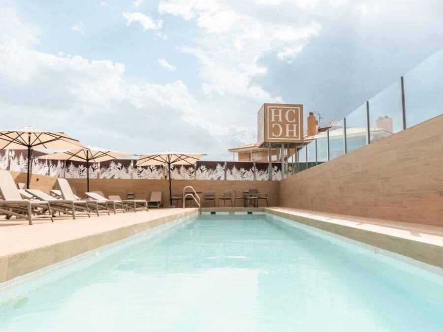 Outdoor pool, open 11:00 AM to 8:00 PM, sun loungers