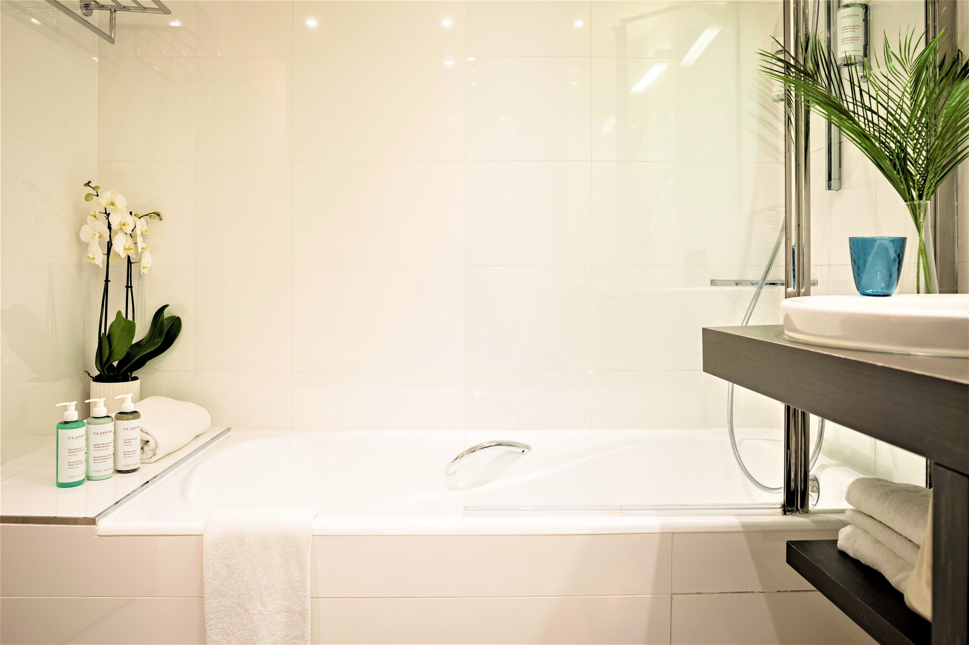 eco-friendly toiletries, hair dryer, bathrobes, slippers