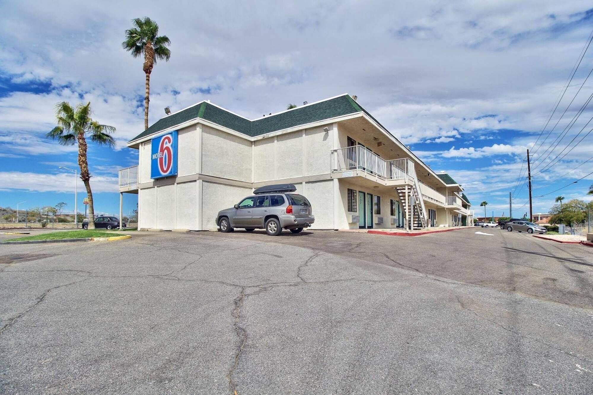 A motel with a sign indicating it is number 6.