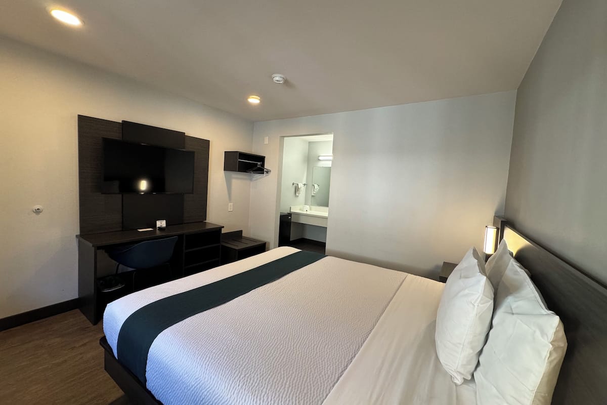 Habitación Deluxe, 1 cama King size, para no fumadores, refrigerador | Wifi gratis y ropa de cama