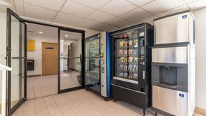 A vending machine area with a Pepsi refrigerator and a water dispenser. - Motel 6 Winslow, AZ (Winslow)