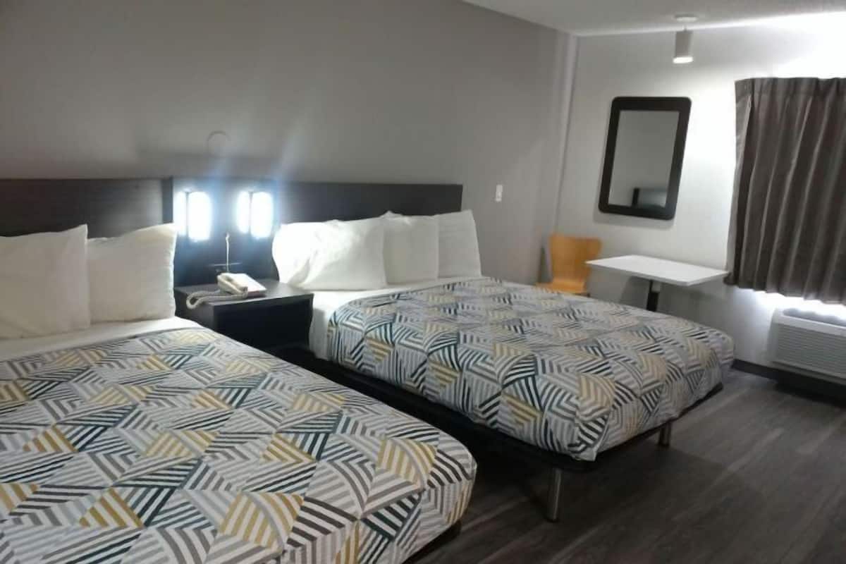 Blackout drapes, WiFi (free), alarm clocks, bed sheets