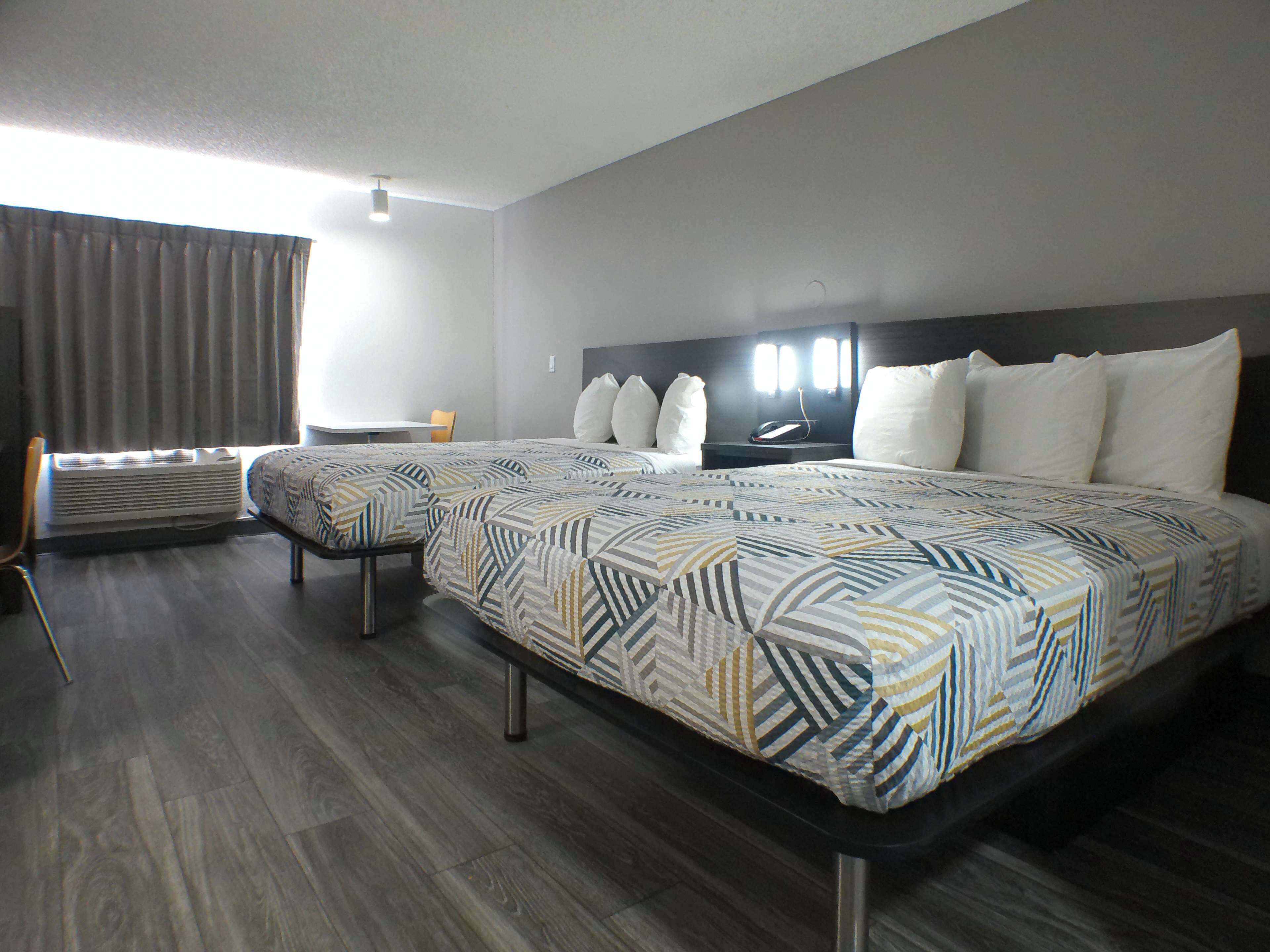 Blackout drapes, free WiFi, bed sheets, alarm clocks