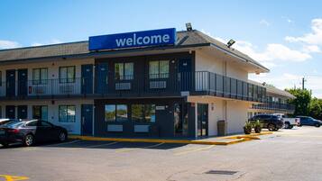 Guests can enjoy a convenient stay at this two-story motel with a welcoming entrance and on-site parking.