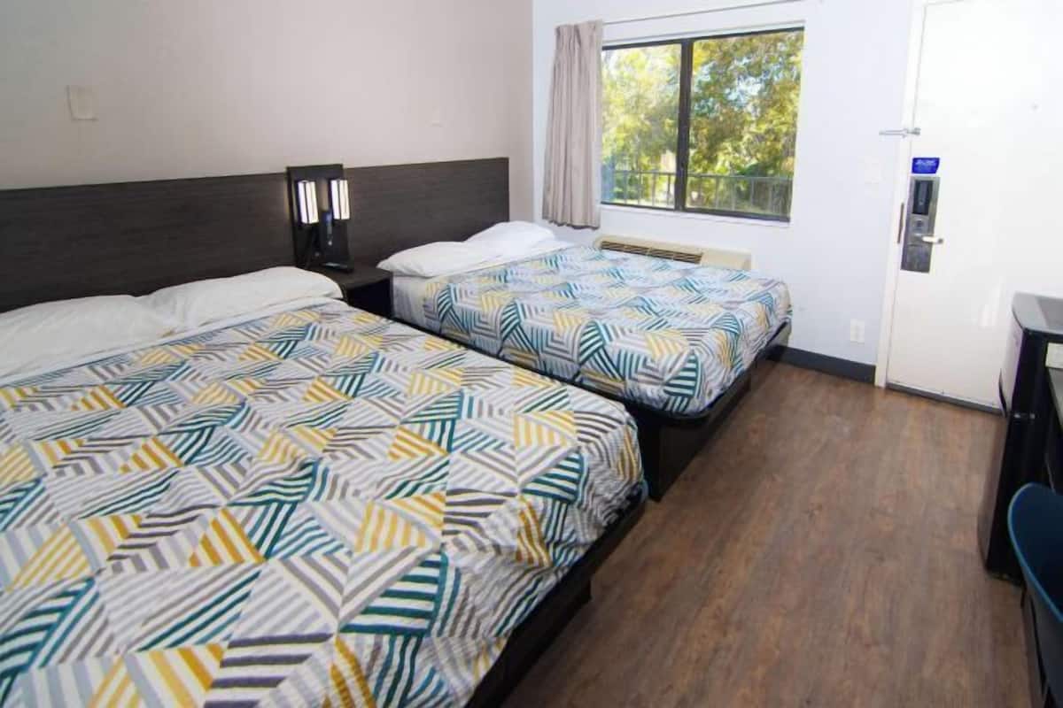 Desk, laptop workspace, free WiFi, bed sheets