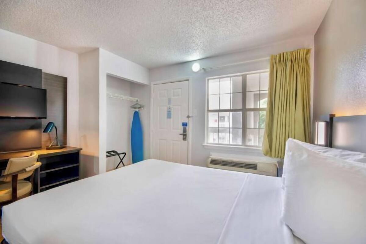 Blackout curtains, iron/ironing board, free WiFi, alarm clocks