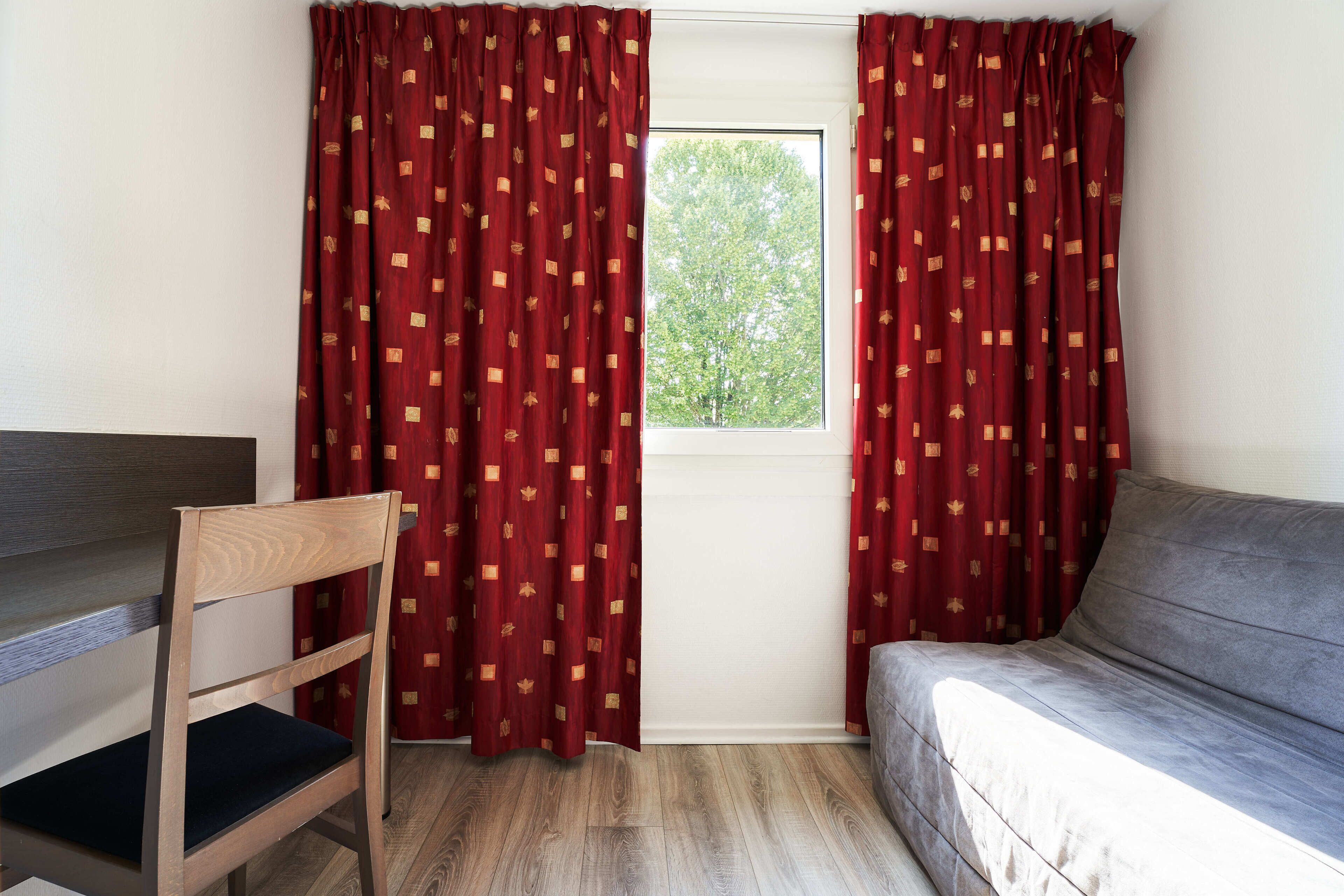 Premium bedding, desk, blackout drapes, soundproofing