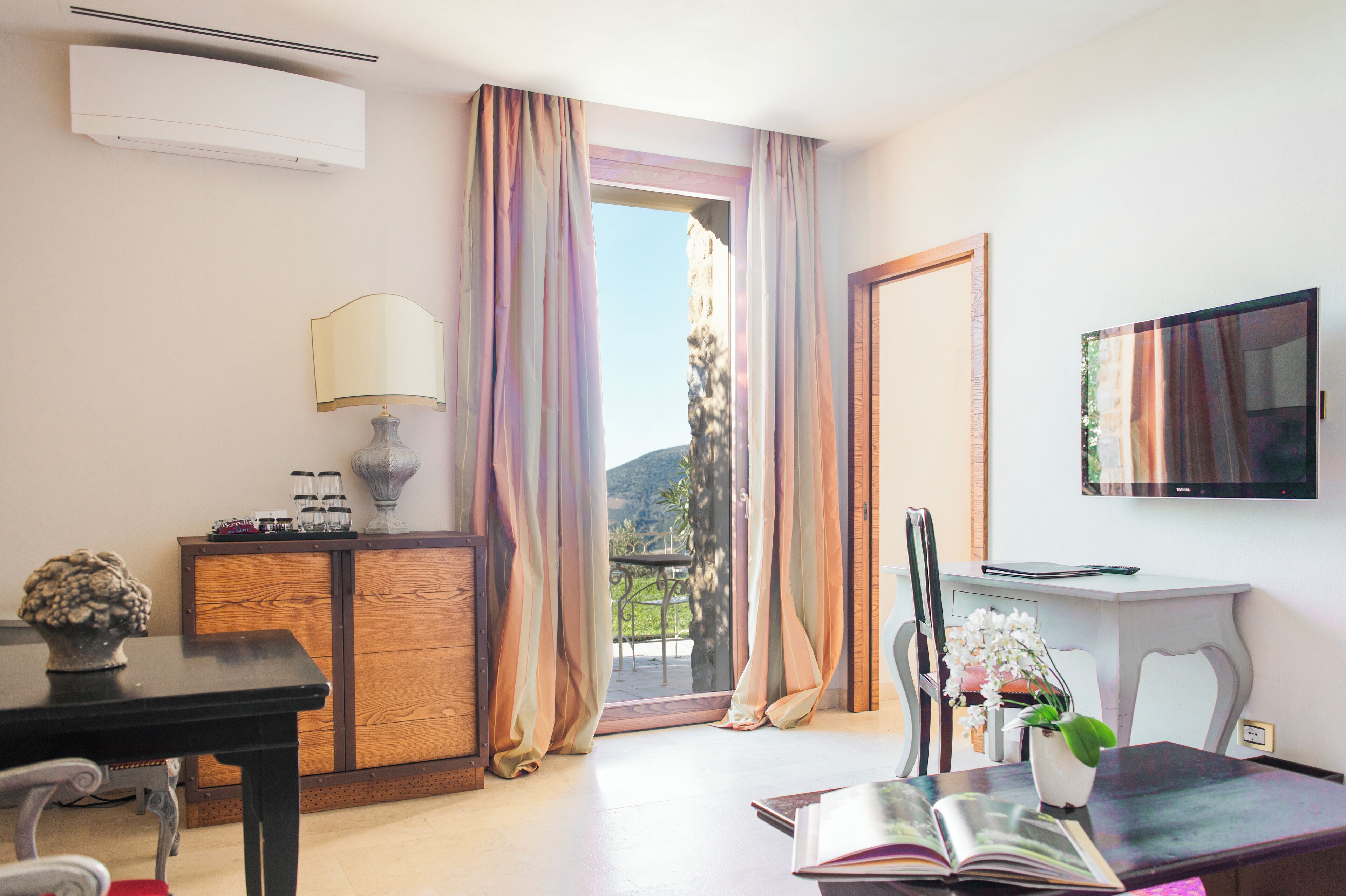 suite terrace (unesco view) | living area | 50-inch lcd tv with digital channels, tv