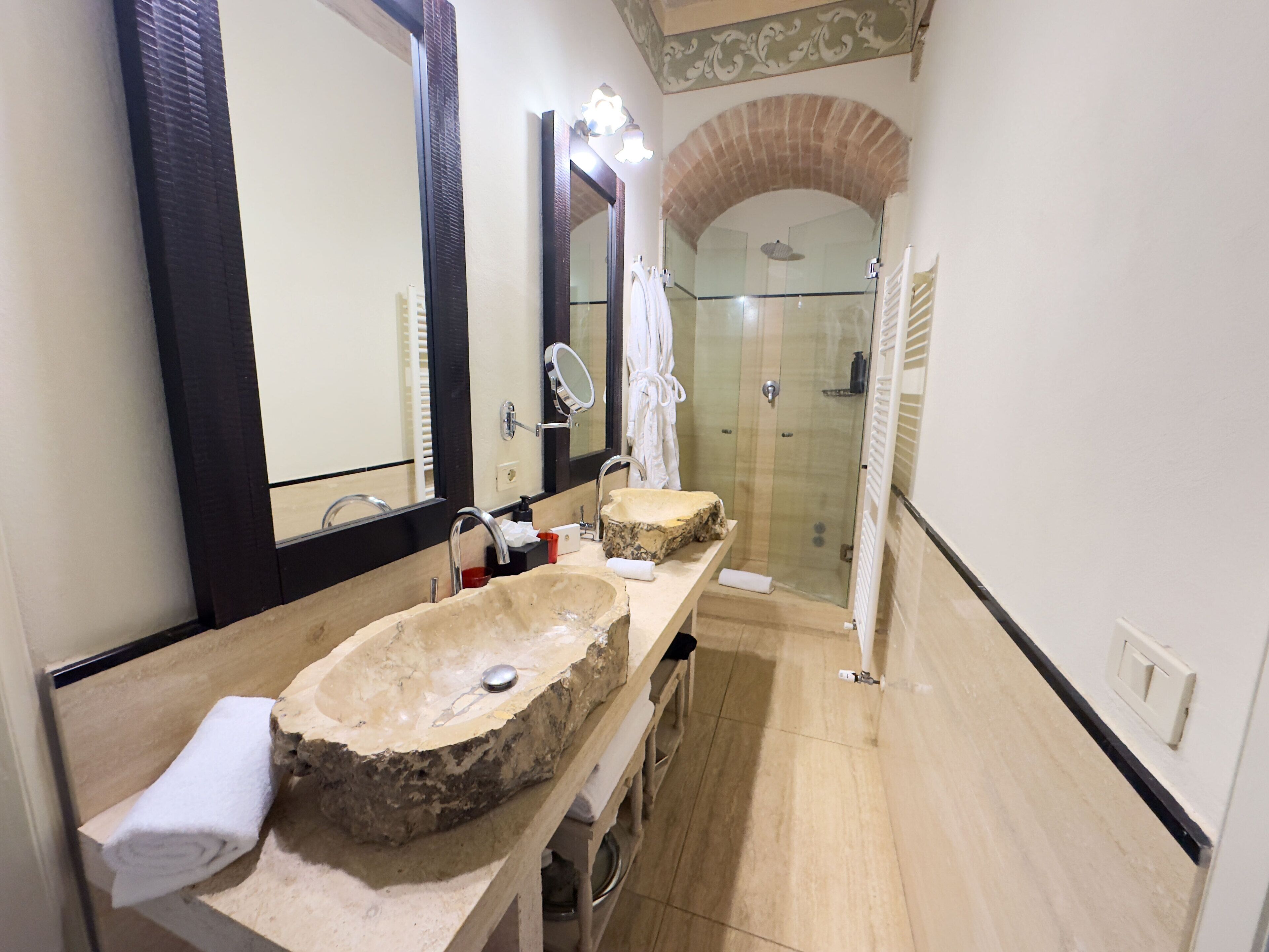 designer toiletries, hair dryer, bathrobes, slippers