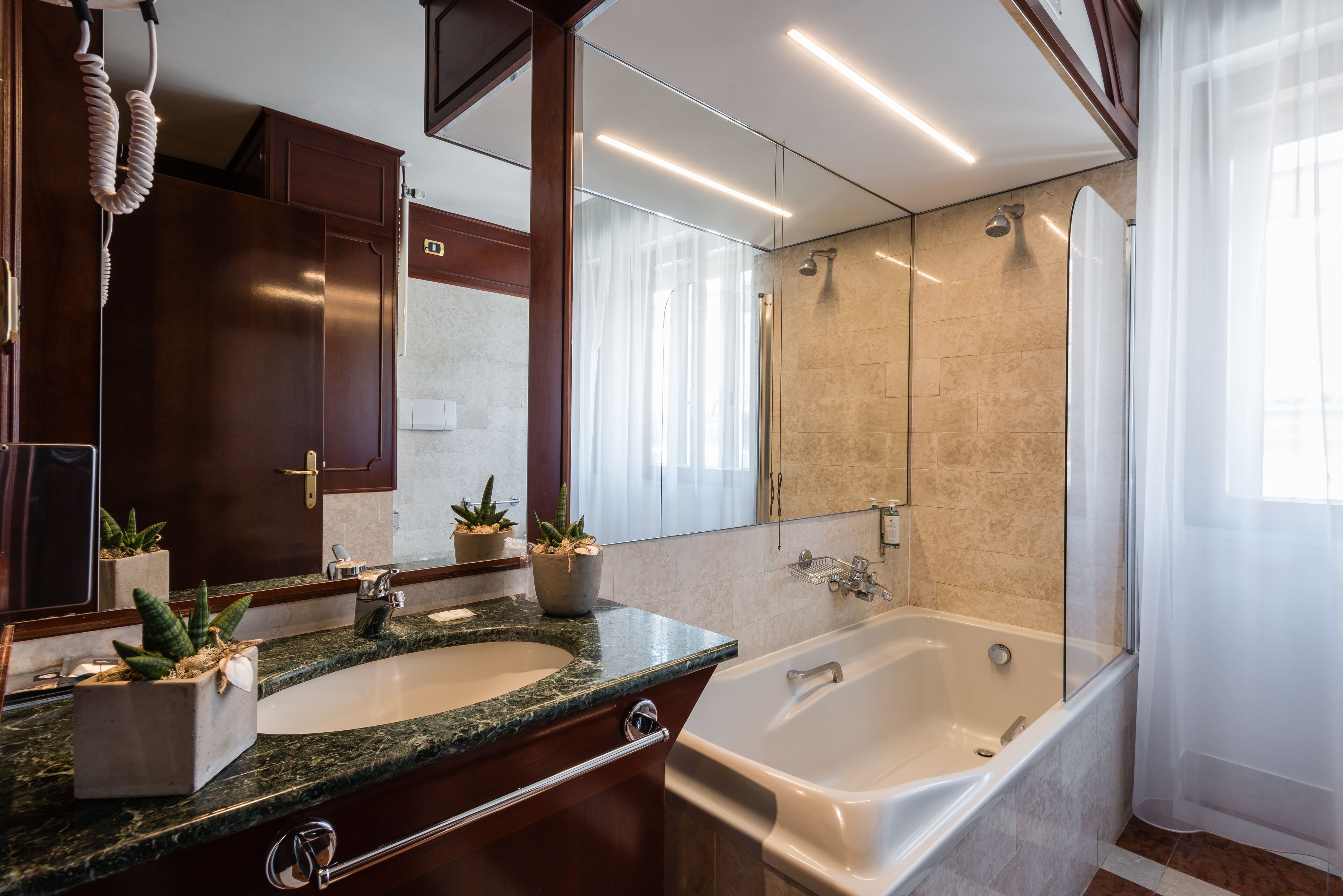 free toiletries, hair dryer, bidet, towels