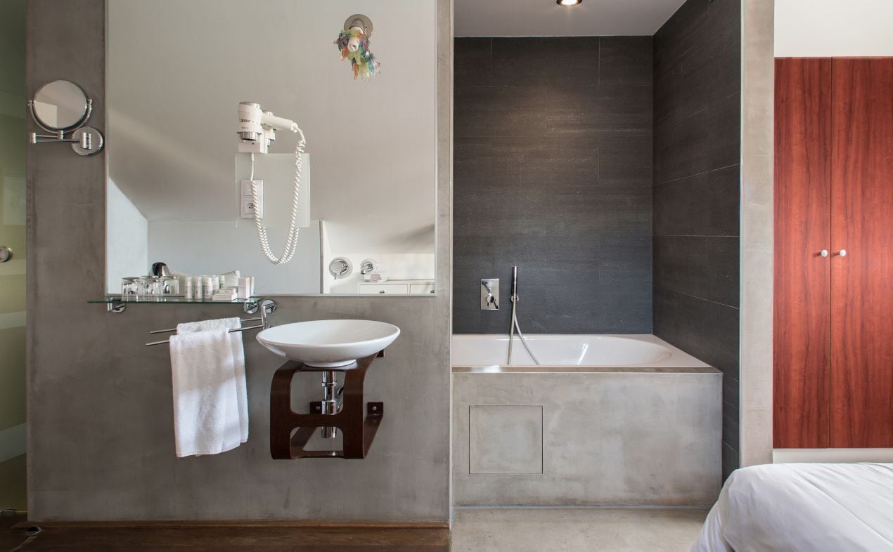 superior room | bathroom | designer toiletries, hair dryer, towels