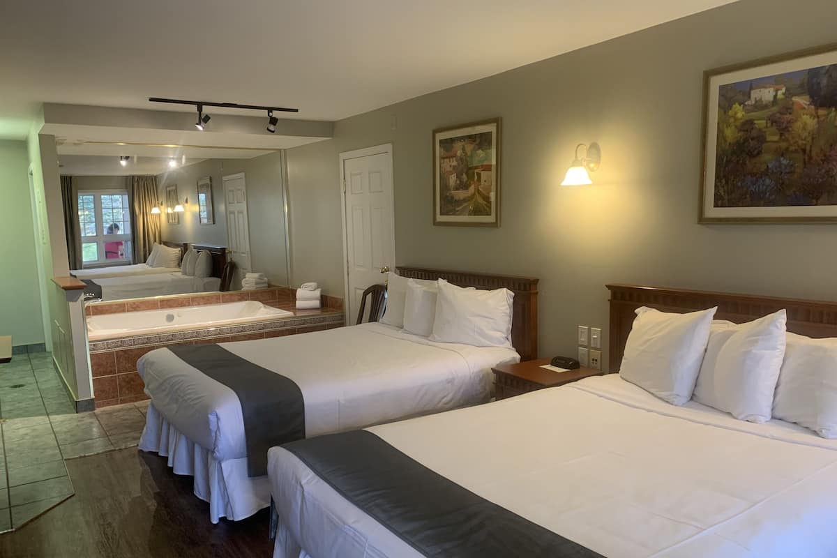 Family Suite, 2 Queen Beds (Whirlpool Bath) | Premium bedding, desk, laptop workspace, blackout curtains