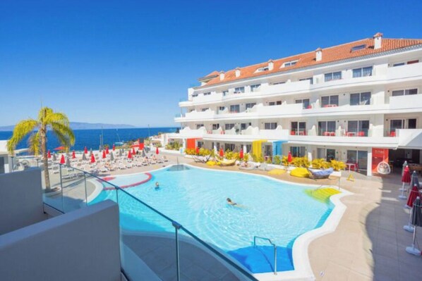 Outdoor pool, pool umbrellas, pool loungers