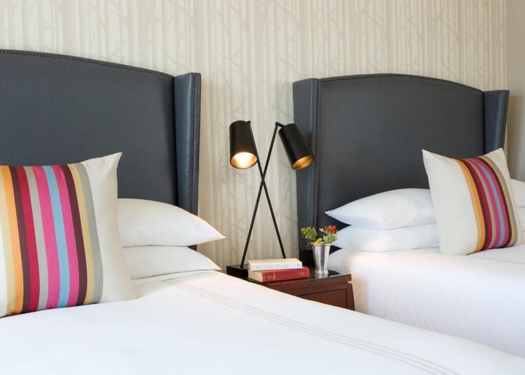 Premium bedding, down comforters, pillowtop beds, in-room safe
