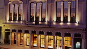 A historic building with large windows and a classic architectural style. - River Terrace Inn (Napa)