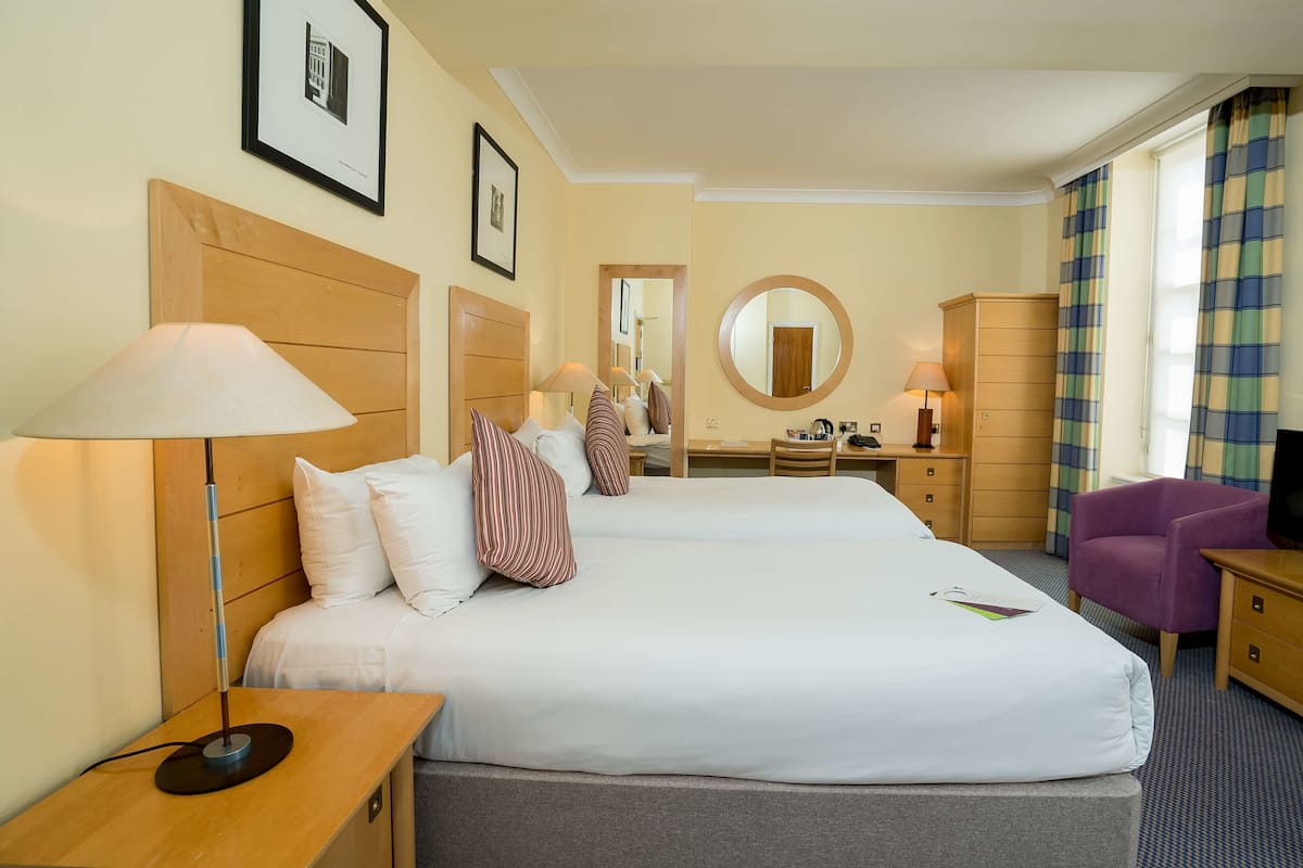 In-room safe, iron/ironing board, WiFi (free), bed sheets