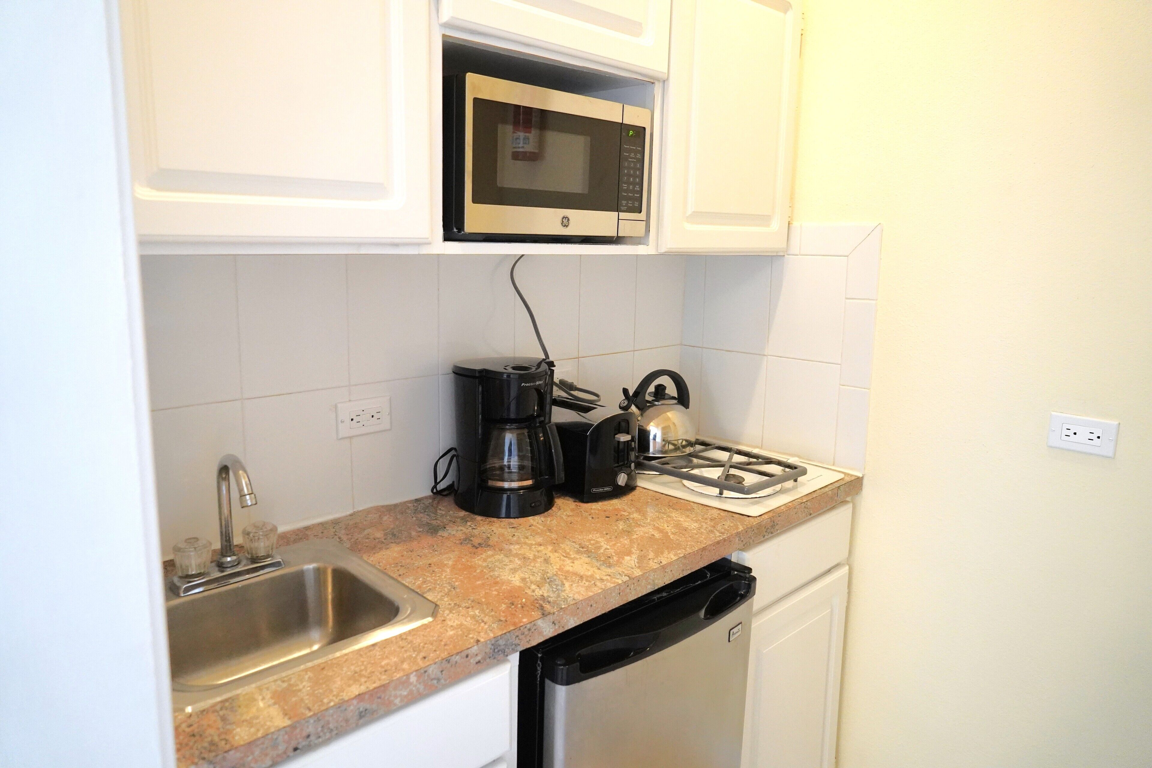 studio, 1 king bed, kitchenette (studio suite, 1 king bed, kitchenett) | private kitchenette | fridge, microwave, coffee/tea maker, high chair