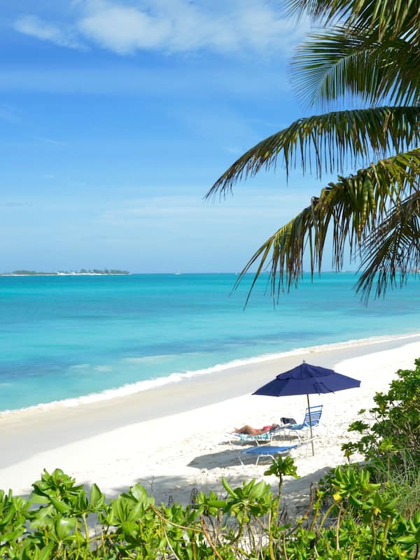 Private beach, white sand, sun loungers, beach umbrellas