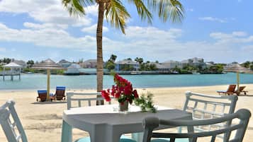 Private beach, white sand, sun-loungers, beach umbrellas