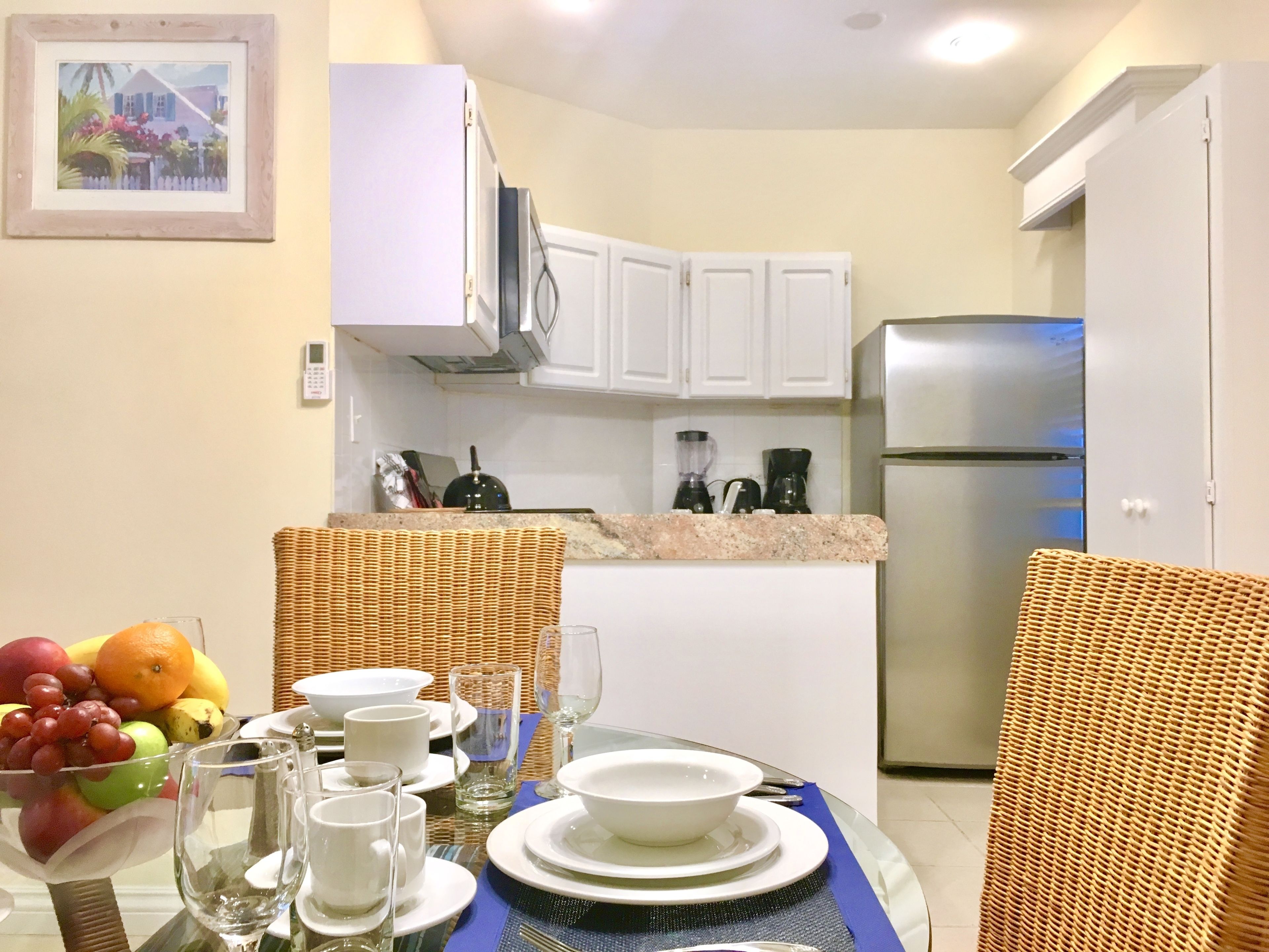 suite, 1 king bed with sofa bed, kitchen, lagoon view | private kitchen | fridge, microwave, coffee/tea maker, high chair