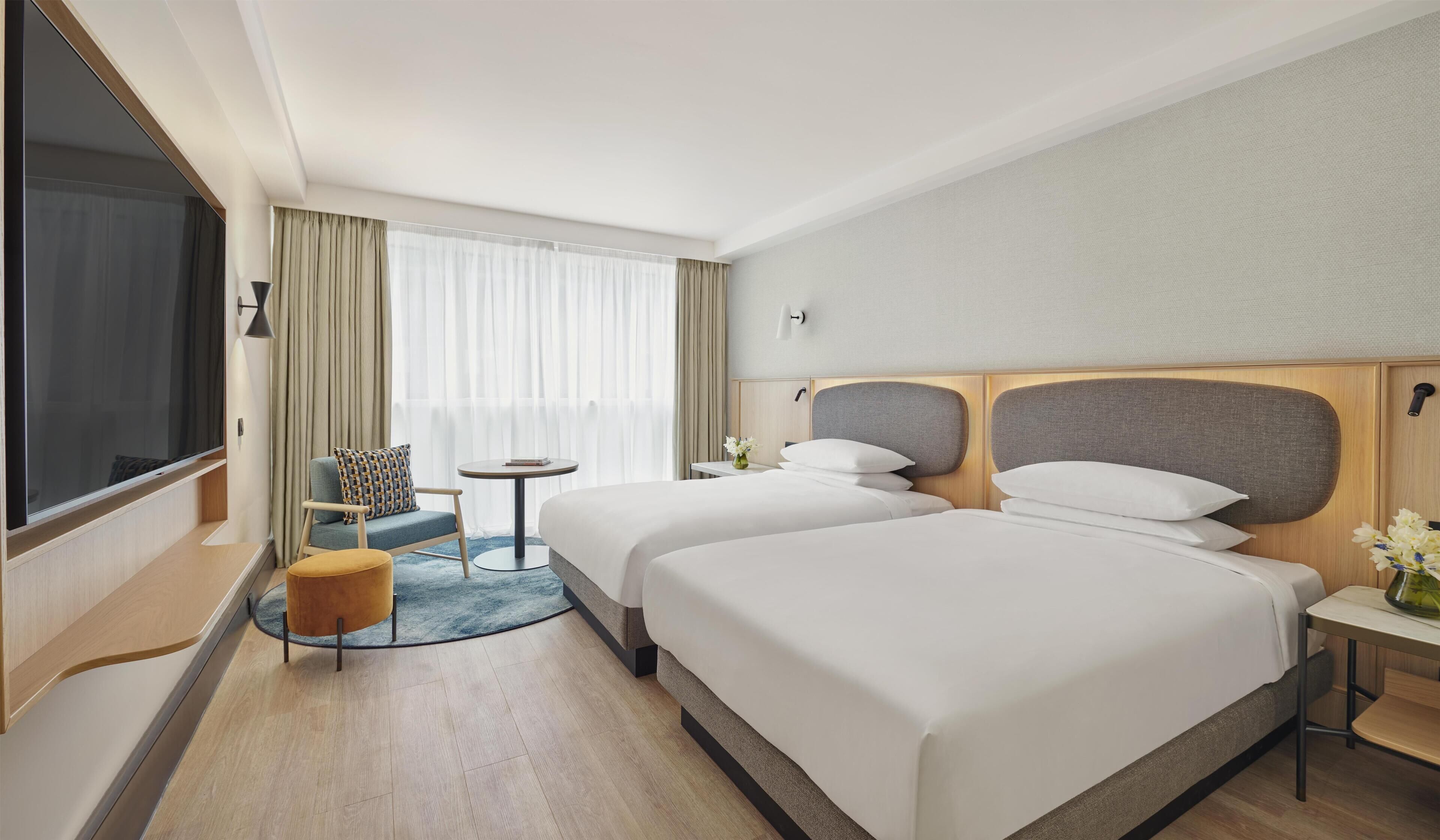 Værelse - 2 enkeltsenge | Premium-sengetøj, minibar, pengeskab på værelset