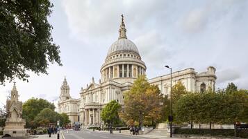 A large historic building with a prominent dome and classical architecture.