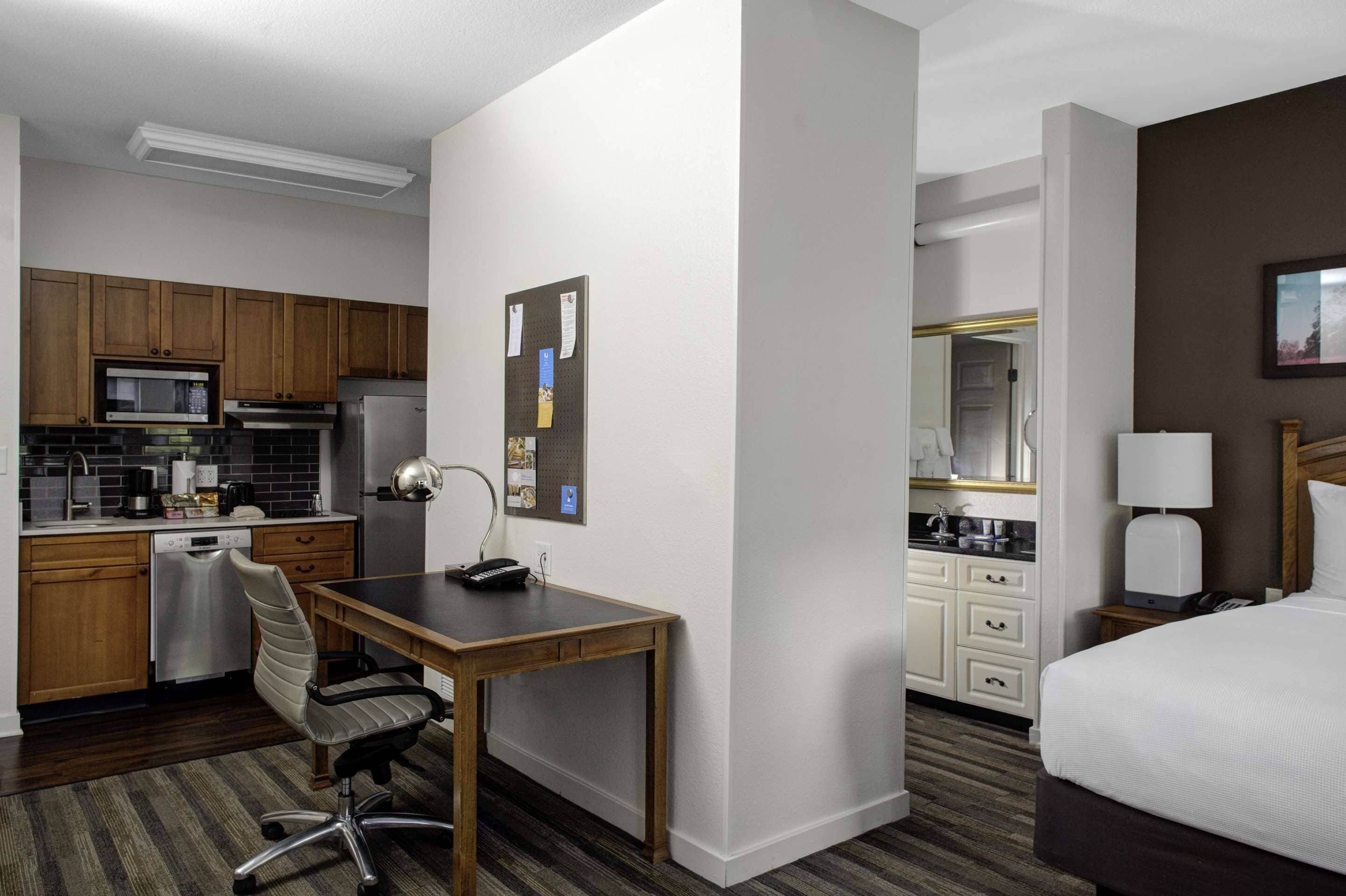Premium bedding, down comforters, pillowtop beds, desk