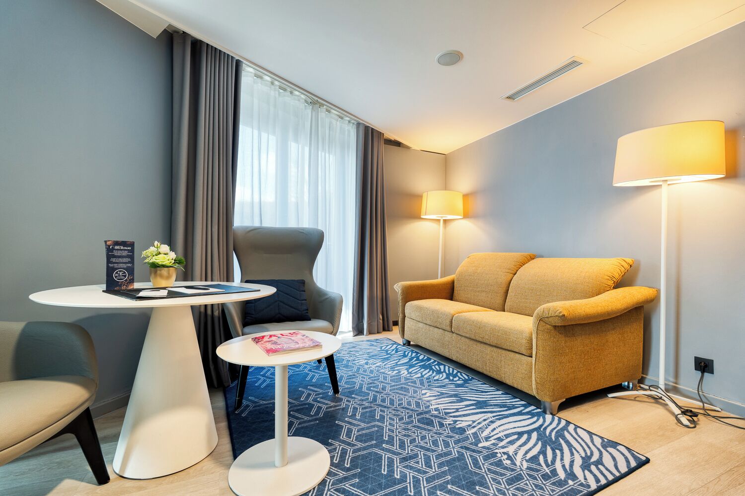 junior suite with terrace | living area | led tv