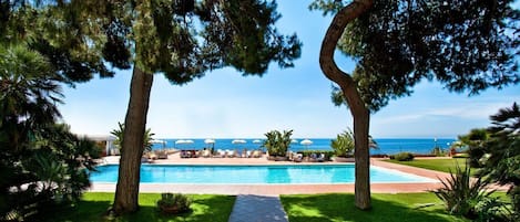 Seasonal outdoor pool, pool loungers