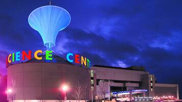 A building with the words "SCIENCE CENTER" prominently displayed on its facade.