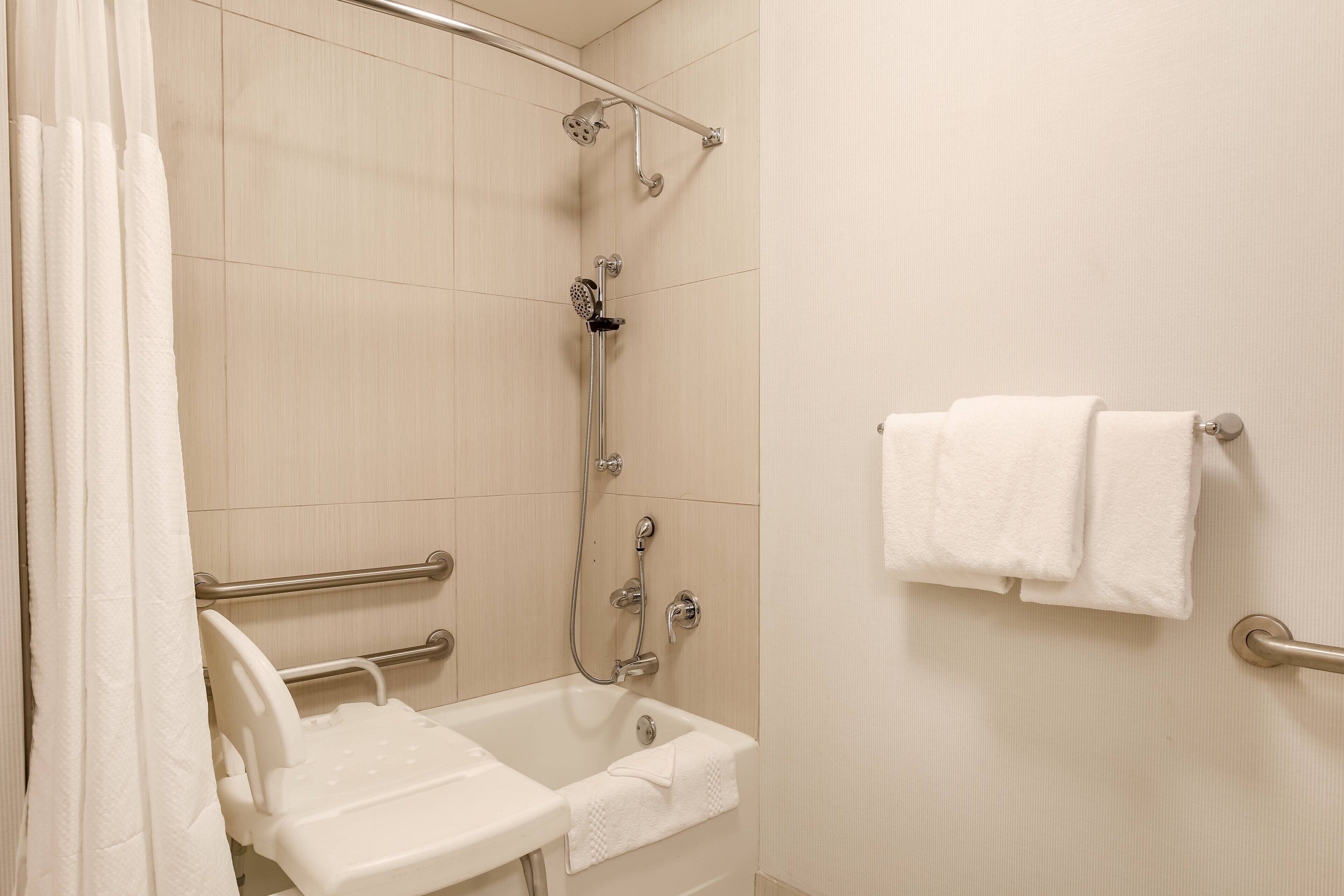 combined shower/bathtub, free toiletries, hair dryer, towels
