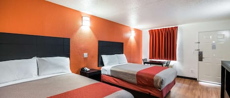 Wifi gratis, ropa de cama y despertador