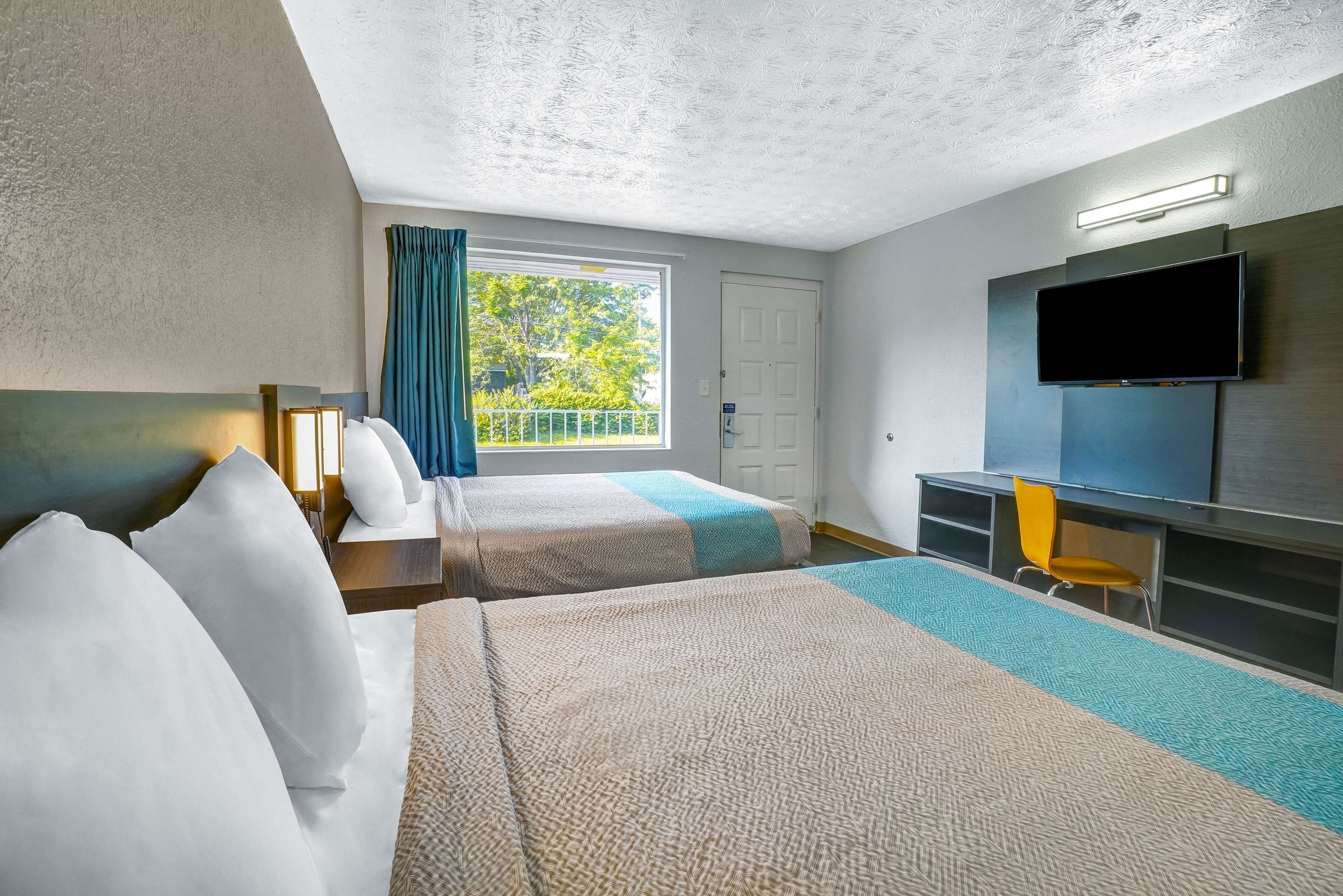 Standard Room, 2 Queen Beds, Non Smoking | Blackout drapes, iron/ironing board (on request), WiFi (free)
