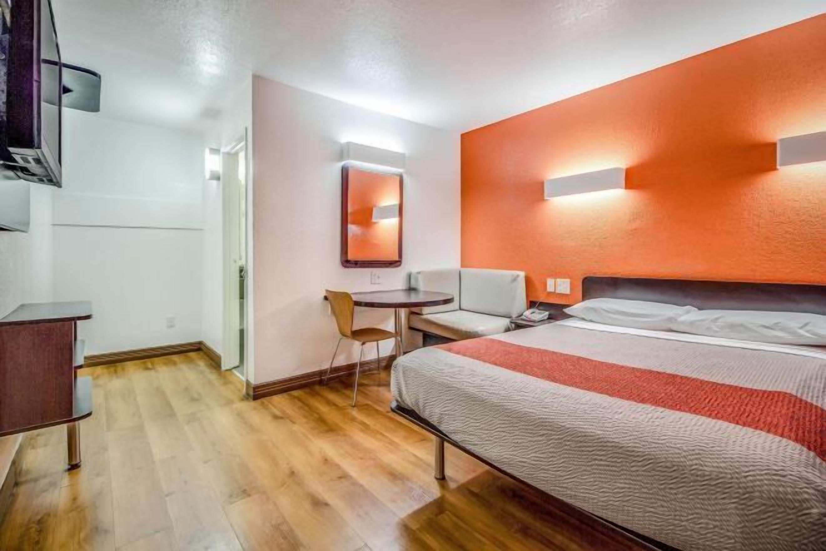 Desk, laptop workspace, free WiFi, bed sheets