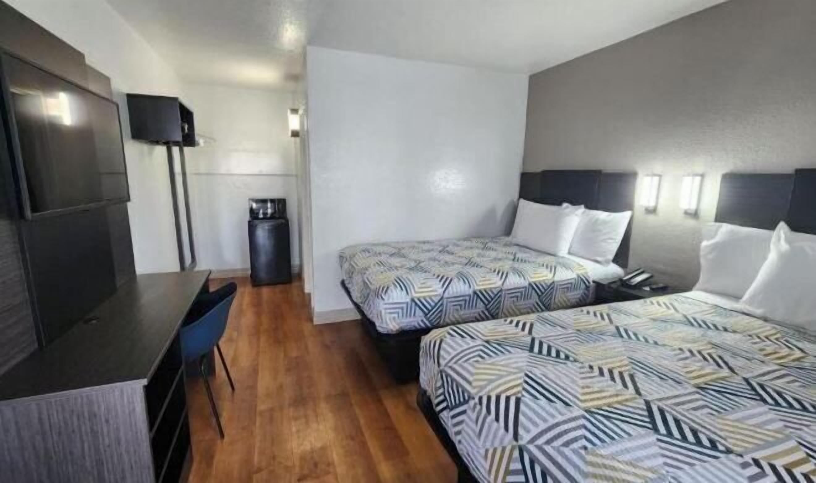 Desk, laptop workspace, free WiFi, bed sheets