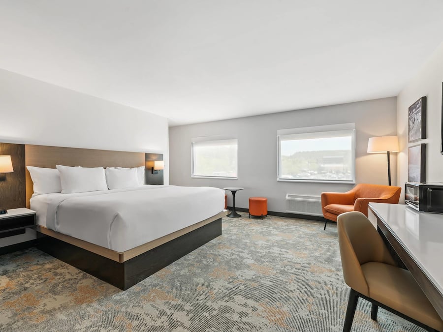 Premium bedding, pillow-top beds, desk, laptop workspace