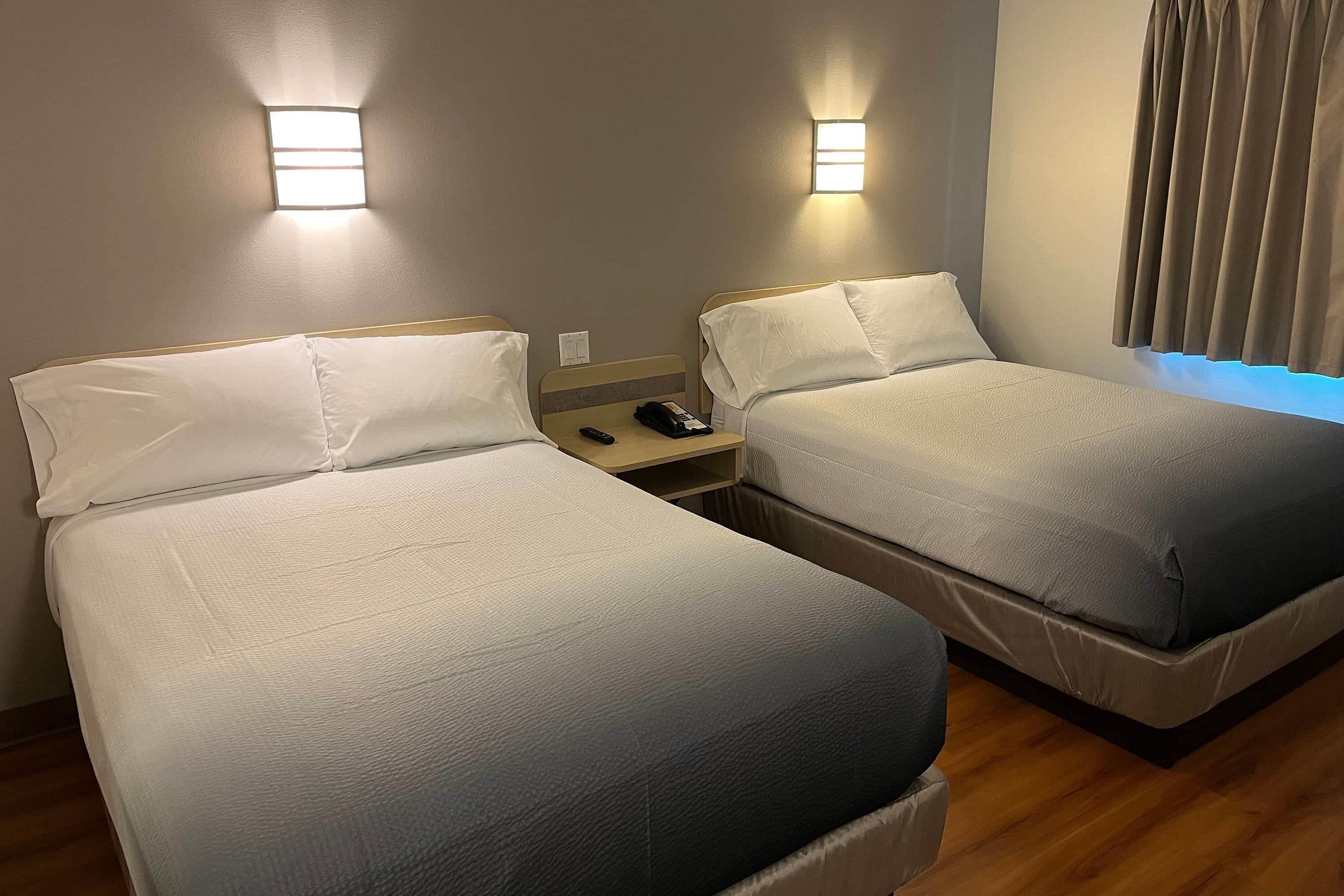 Desk, laptop workspace, free WiFi, bed sheets