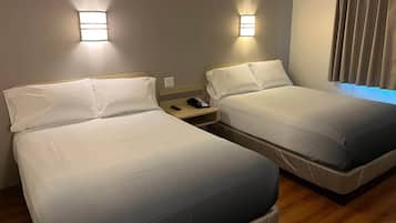 Desk, laptop workspace, free WiFi, bed sheets